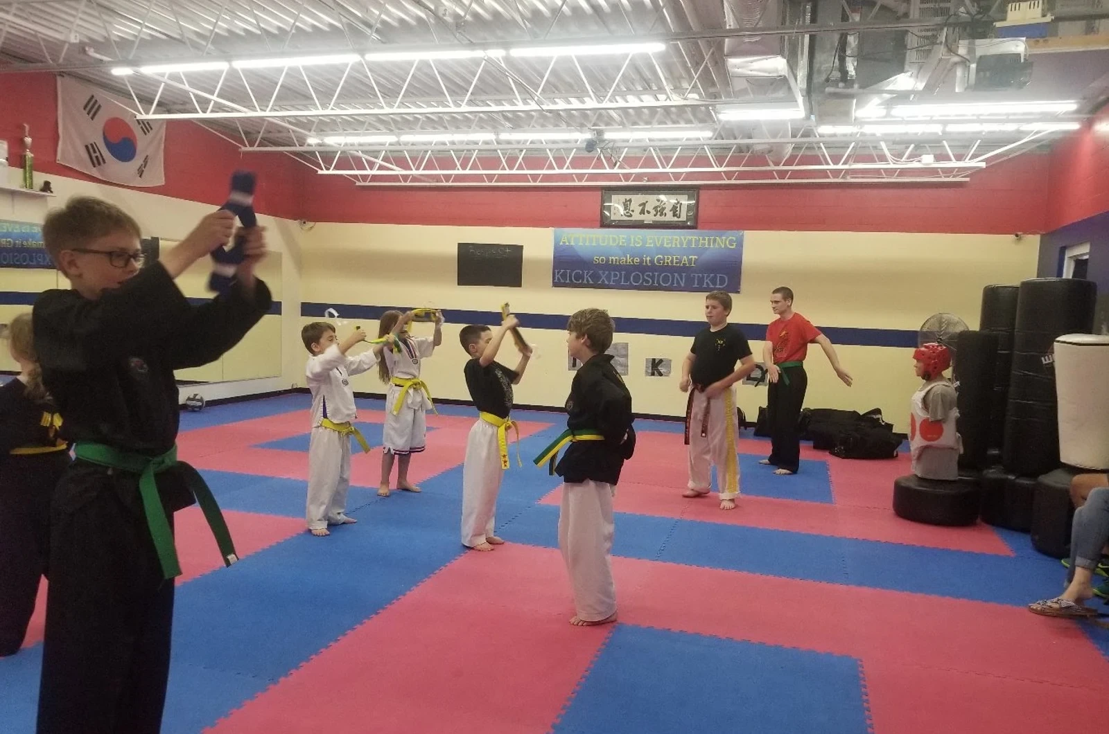 Kids learning discipline through martial arts